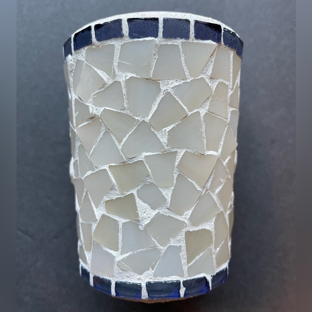 White and blue glass candle holder.